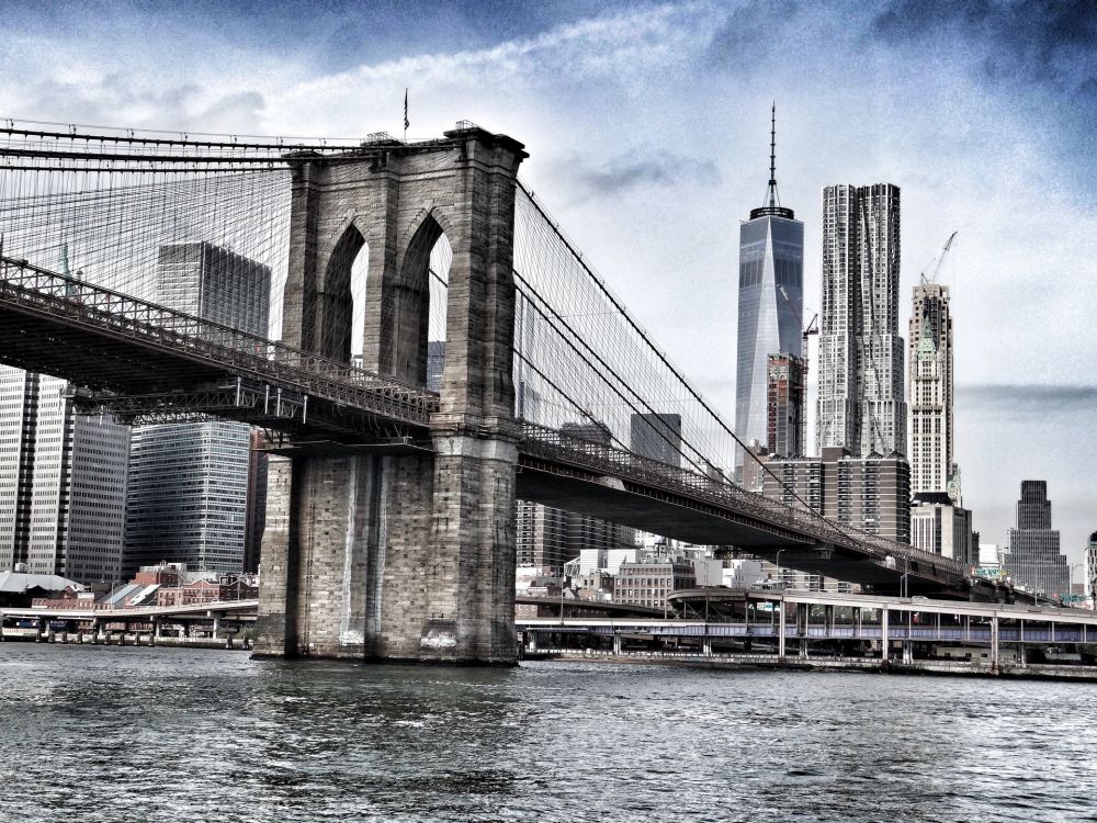 Brooklyn Bridge with Manhattan skyline.